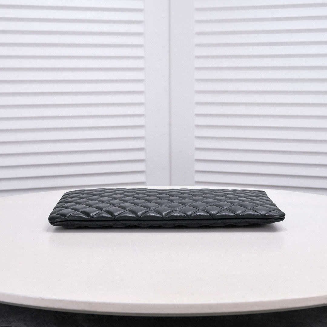CHANEL - Lambskin O Case clutch bag