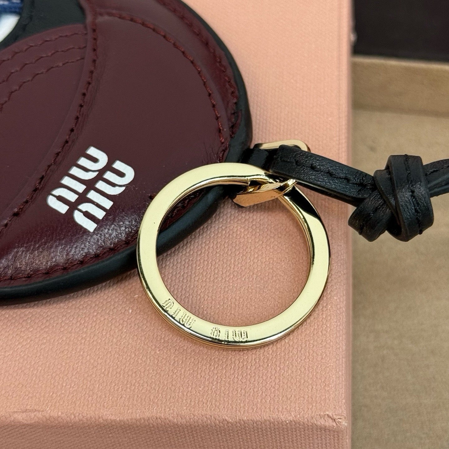 MIU MIU - leather key ring trick