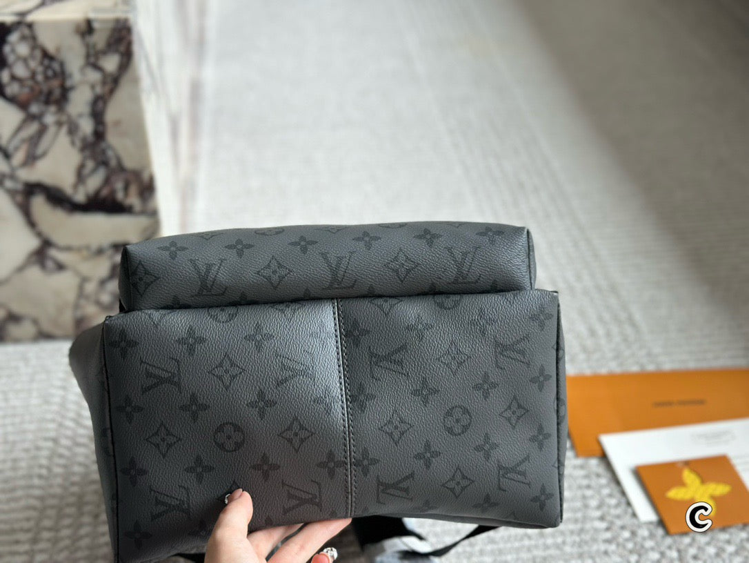LOUIS VUITTON- Discovery Backpack PM