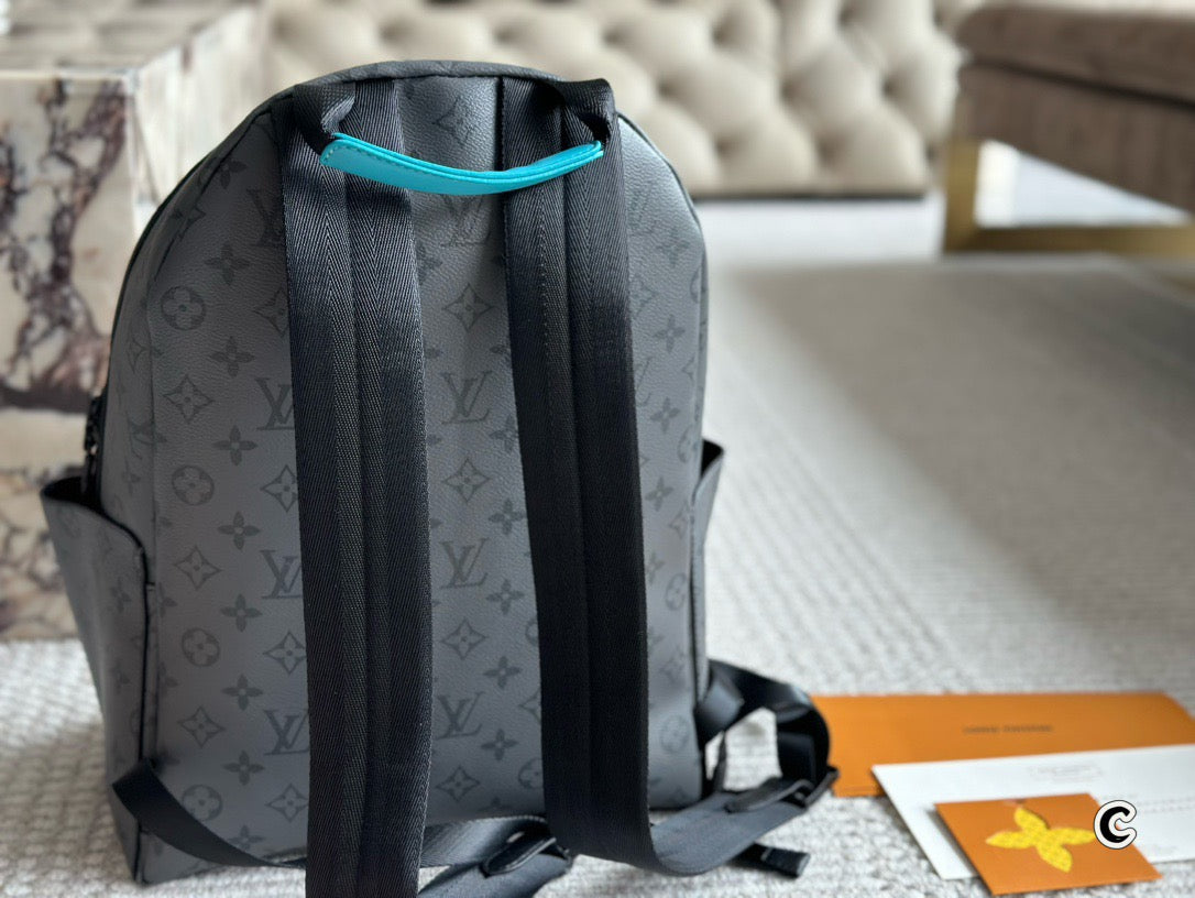 LOUIS VUITTON- Discovery Backpack PM