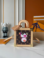 LOUIS VUITTON- Tidy bag