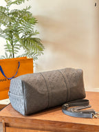 LOUIS VUITTON- Keepall Bandouliere 50