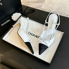 CHANEL - Vintage Iconic "CC" White & Black Toe Cap Slingback Heels