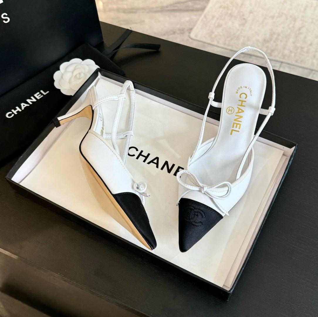 CHANEL - Vintage Iconic "CC" White & Black Toe Cap Slingback Heels