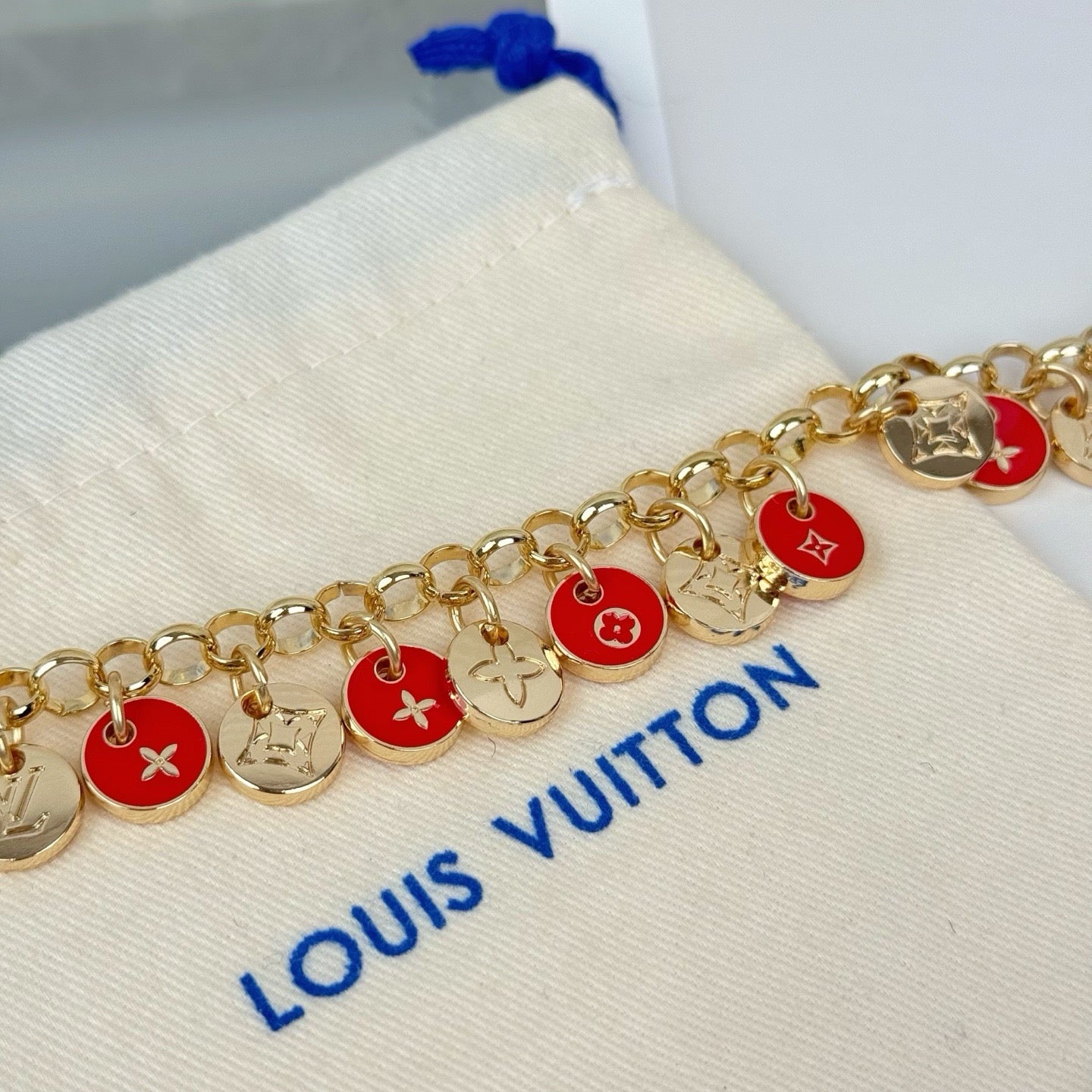 LOUIS VUITTON- bag charm