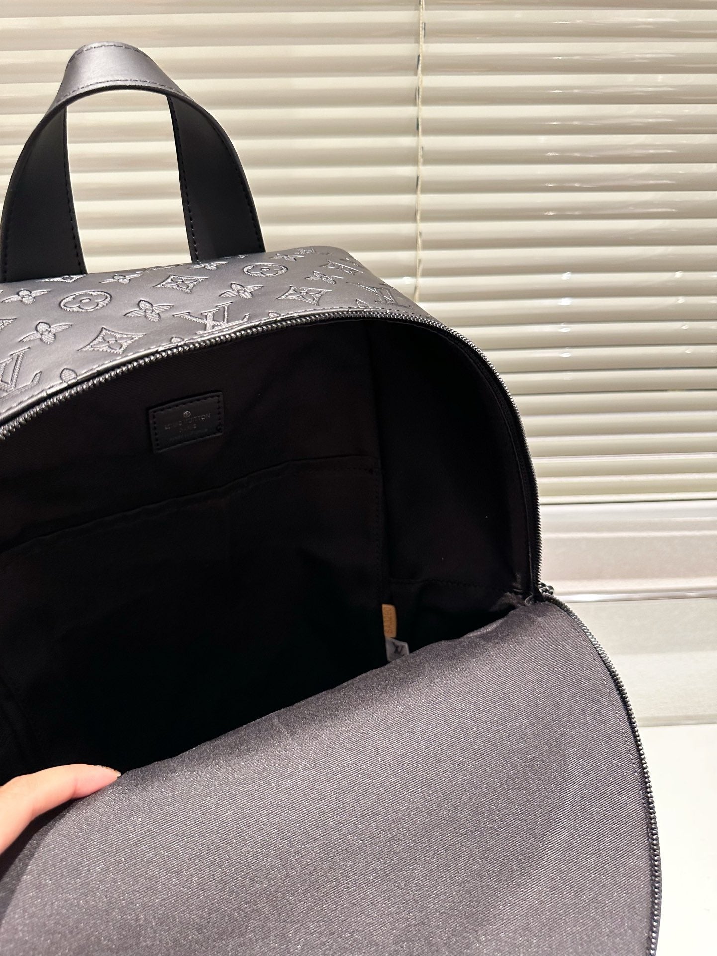 LOUIS VUITTON- Leather Backpack