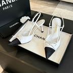 CHANEL - Vintage Iconic "CC" White & Black Toe Cap Slingback Heels