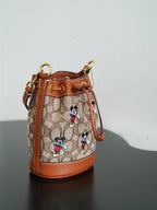 COACH - Disney Mini Dempsey Bucket Bag In Signature Jacquard Mickey Mouse