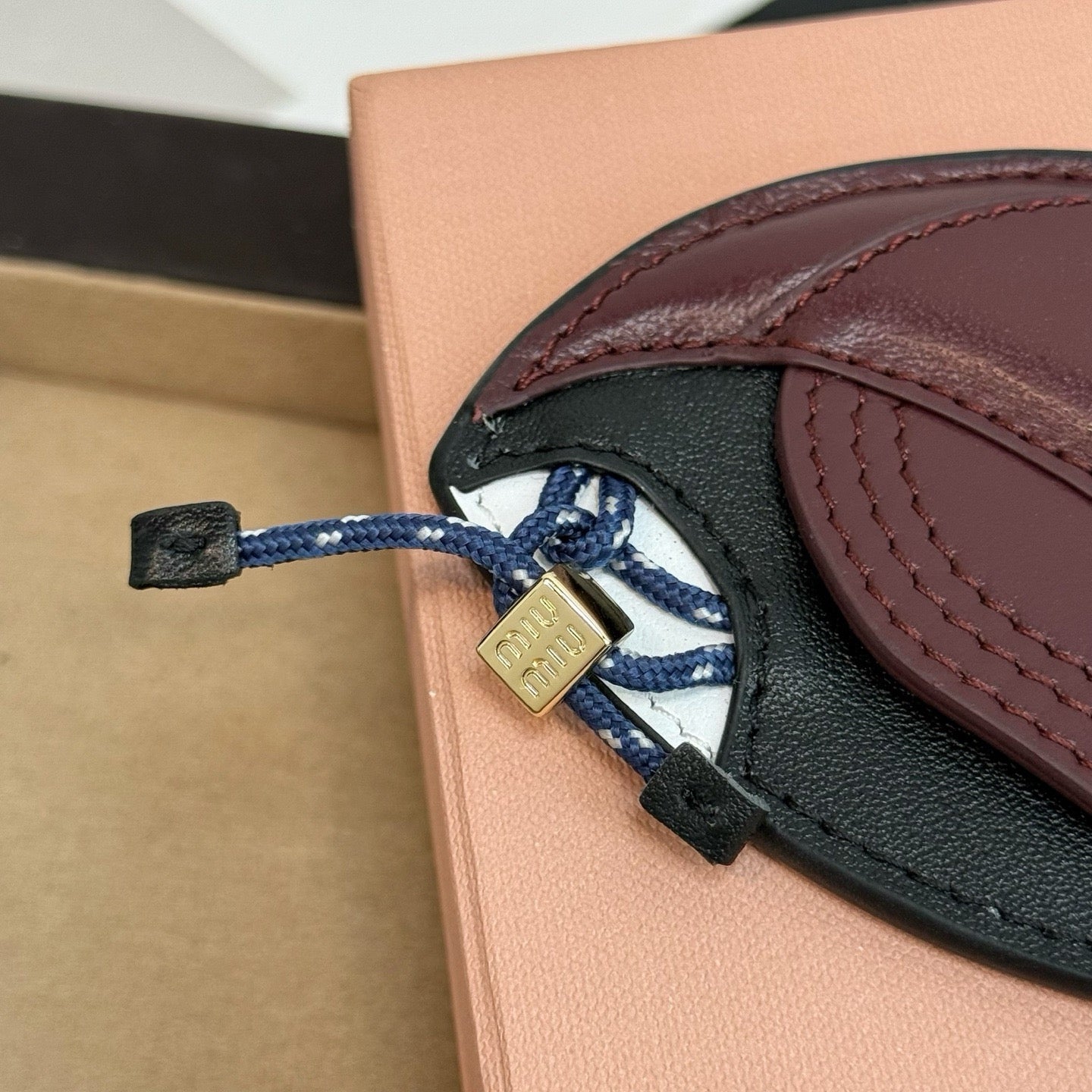 MIU MIU - leather key ring trick