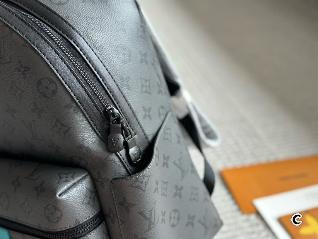 LOUIS VUITTON- Discovery Backpack PM