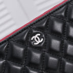 CHANEL - Lambskin O Case clutch bag