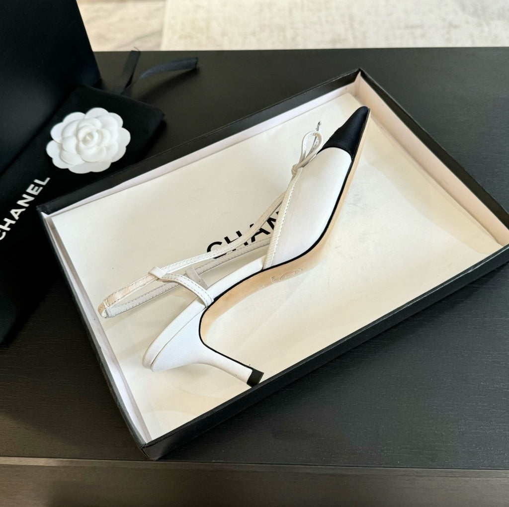 CHANEL - Vintage Iconic "CC" White & Black Toe Cap Slingback Heels
