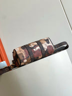 LOUIS VUITTON - Monogram Portrait Keepall Bandouliere 25 Brown