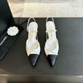CHANEL - Vintage Iconic "CC" White & Black Toe Cap Slingback Heels