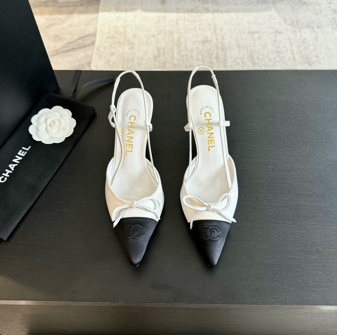 CHANEL - Vintage Iconic "CC" White & Black Toe Cap Slingback Heels