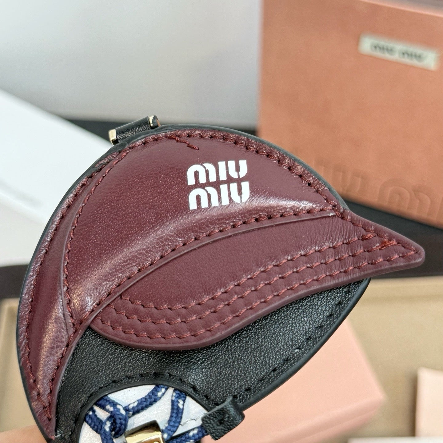 MIU MIU - leather key ring trick