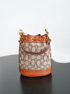 COACH - Disney Mini Dempsey Bucket Bag In Signature Jacquard Mickey Mouse